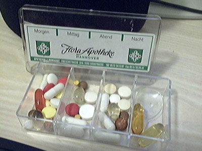 My father's pill box - all the pills for ONE DAY